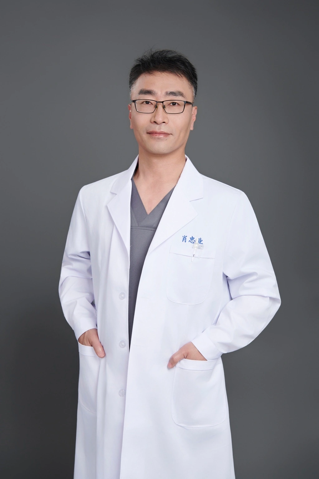 Dr. Xiao in a clinical portrait