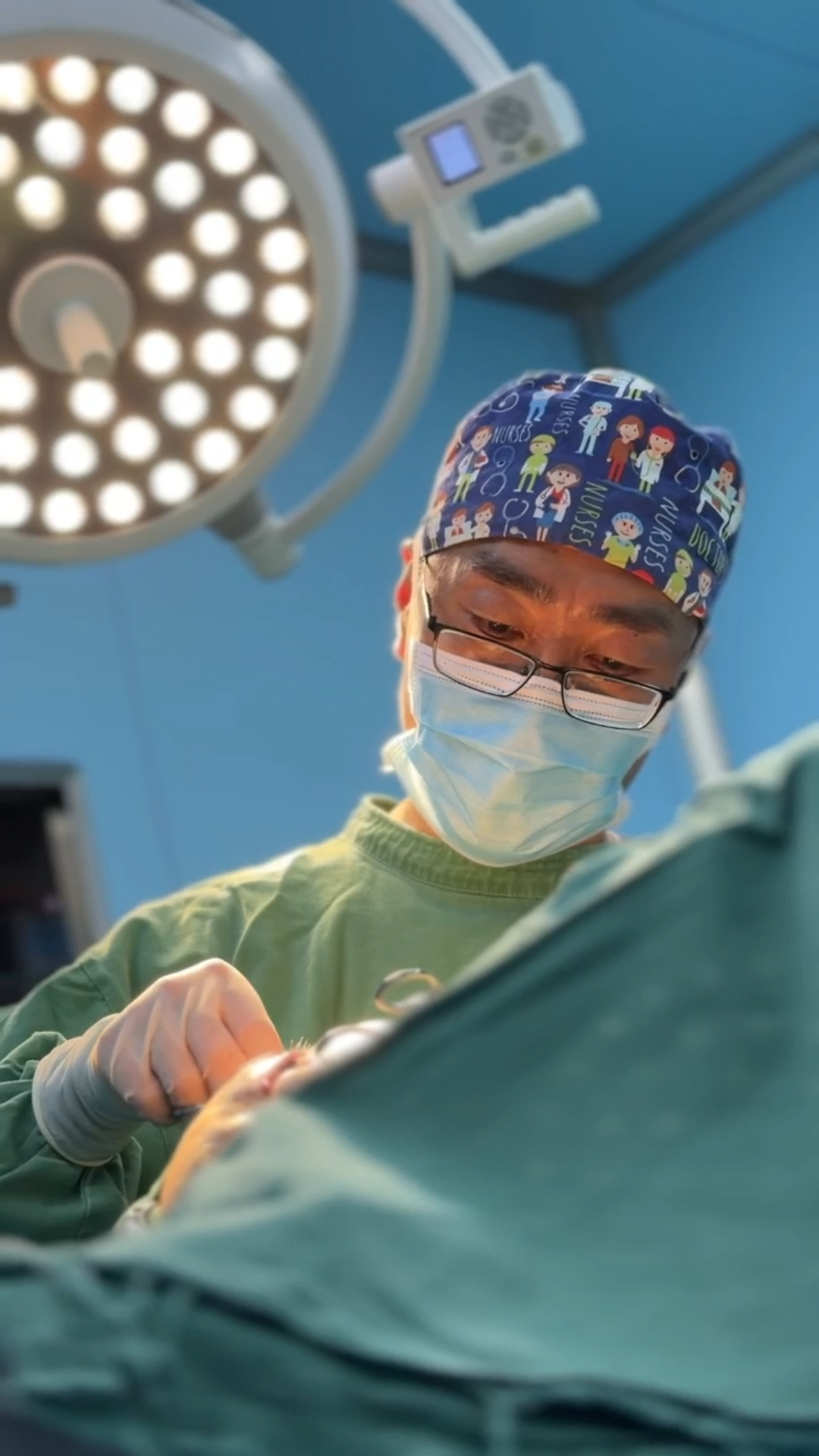 Dr. Xiao working in an operating room